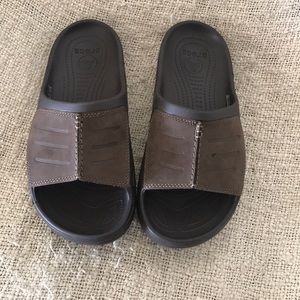 Crocs, brand new pair of leather detailed slides